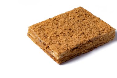 Honey cake on white background. Close up view