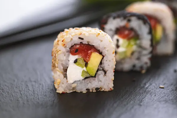 Sushi roll with rice. Sushi menu. Japanese food.