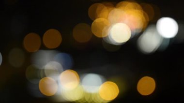 Gece Bokeh 'le parlayan odağını kaybetmiş şehir ışıkları