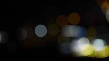 Şehir gece lambasının soyut dairesel bokeh arkaplanı, odaklanmamış