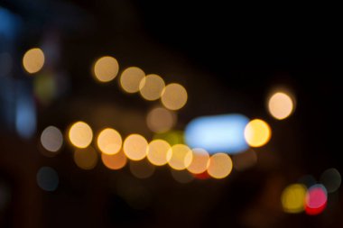 Şehir gece lambasının soyut dairesel bokeh arkaplanı, odaklanmamış