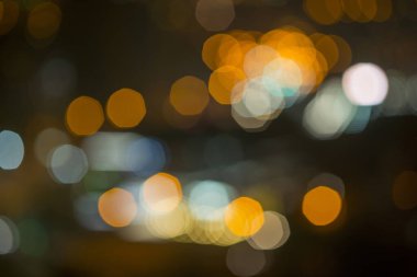 Şehir gece lambasının soyut dairesel bokeh arkaplanı, odaklanmamış
