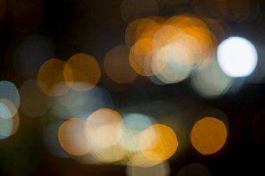 Şehir gece lambasının soyut dairesel bokeh arkaplanı, odaklanmamış