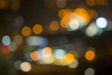 Şehir gece lambasının soyut dairesel bokeh arkaplanı, odaklanmamış