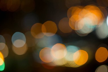 Şehir gece lambasının soyut dairesel bokeh arkaplanı, odaklanmamış