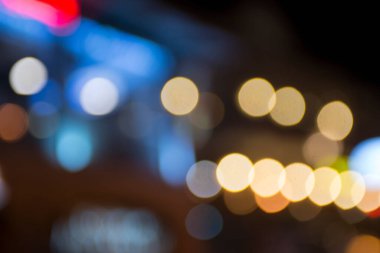 Şehir gece lambasının soyut dairesel bokeh arkaplanı, odaklanmamış