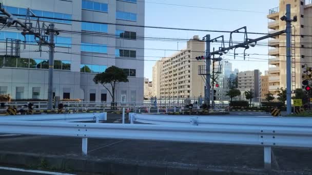 Tokyo Shinagawa Railroad Crossing November 2022 — Stock Video
