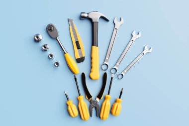 3D illustration of a metal hammer, screwdrivers, pliers, level, tape measure, electrical tape, cutter with yellow handles on a blue background. 3D render and illustration of a hand tool