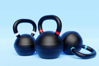 Training weights  on blue isolated background. Dumbbells, kettlebell.