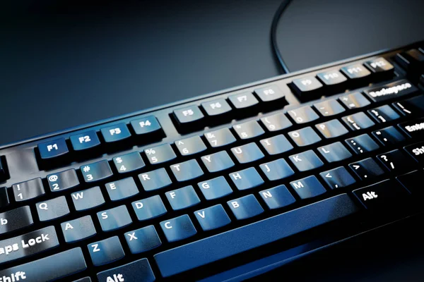 3d illustration, close up of the realistic computer or laptop keyboard  on black background .  Gaming keyboard with LED backlit