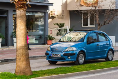  Side, Turkey -January 21, 2023:    blue  Citroen 3 Aircross   is driving on the street on a warm autumn day 