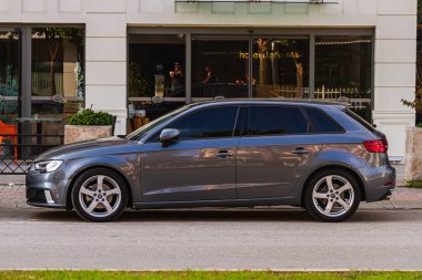  Side, Turkey -January 21, 2023:    black  Audi A3   is parking  on the street on a  summer day 