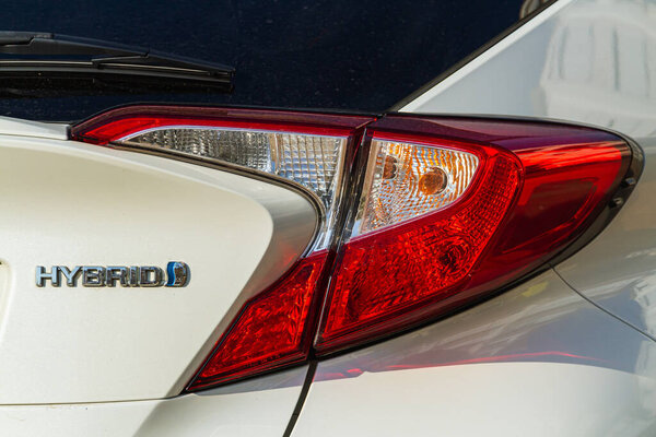  Side, Turkey -January 21, 2023: Honda CH-R, close up detail on one of the LED red rear light modern white car. Внешняя деталь автомобиля