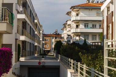 Side, Turkey -January 21, 2023:  Colorful Turkish streets with low houses,   palms