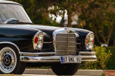 Side, Turkey -January 22, 2023:   Mercedes-Benz w108, front view. Photography of a classic car on a street 
