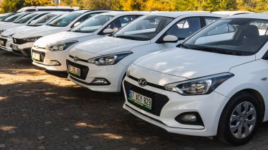 Side , Turkey -  January  27, 2023:  parking for rent white  Hyundai i20 on the street 