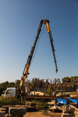 Reconstruction of an old building in the city of Side. Active reconstruction of the old ancient city