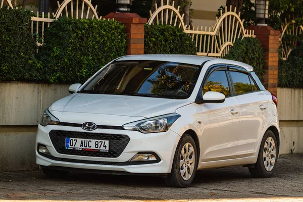 stock image Side, Turkey  january 23 2023:   white  Hyundai i20  is parking  on the street on a  summer day  