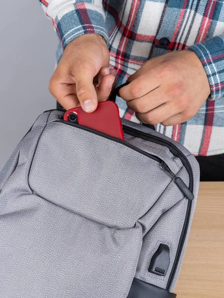 Close Young Male Student Taking Out Phone His Backpack — Stock Photo, Image