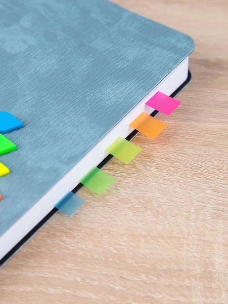 Close Multi Colored Bookmarks Gray Notepad — Stock Photo, Image