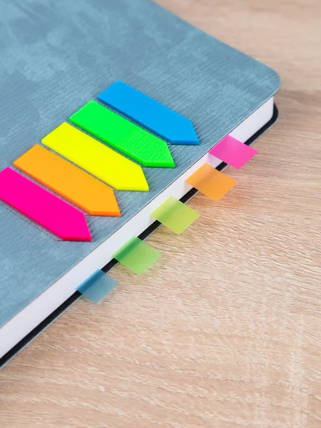 Close Multi Colored Bookmarks Gray Notepad — Stock Photo, Image