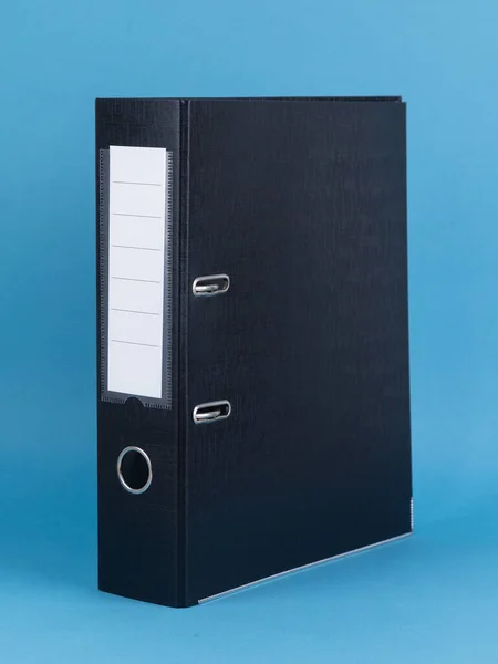 Black office folder on blue background. Office Folder Template