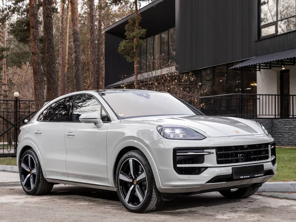 stock image Novosibirsk, Russia -  November 16  , 2023:       white Porsche Cayenne, SUV parked in city ,  front view