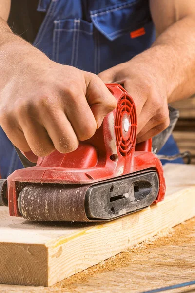 Close Hand Man Carpenter Sanding Plank Smooth Electric Sander Machine — Stock Photo, Image