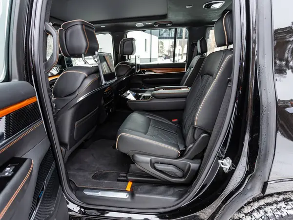 stock image Novosibirsk, Russia - February  29 , 2024:  Jeep Wagoneer , Car interior, part of back black  seats