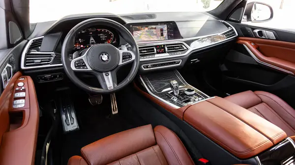 stock image Novosibirsk, Russia - March  23 , 2024:  black  BMW X7 ,  cockpit interior cabin details, speedometer and tachometer. Black leather interior.