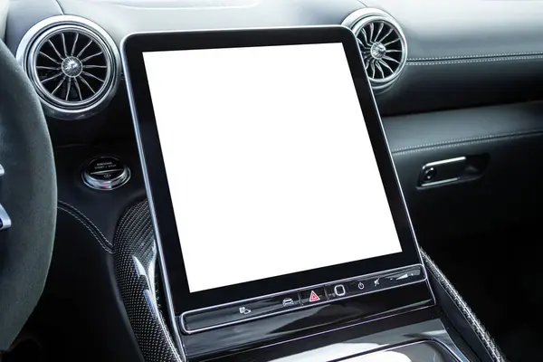 Close-up of a car panel with a white monitor for design, radio, player and control buttons.