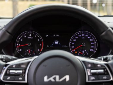 Novosibirsk, Russia -  April 30  , 2024: Kia K3 ,  close up of the speedometer with rpm and km meter clipart