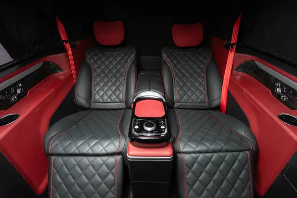 Novosibirsk, Russia -  April 13  , 2024: Mercedes-Benz V-Class, close-up of leather black and red rear seats in the comfortable interior of a prestigious car