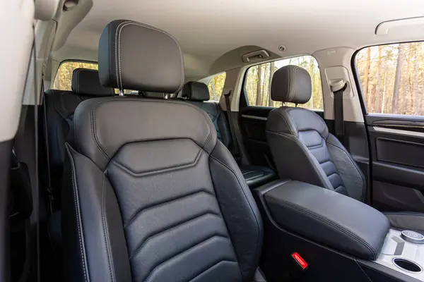 stock image Novosibirsk, Russia -  April 13  , 2024: gray  Volkswagen Touareg , Close-up    black  leather   passenger seats. Luxury car interior
