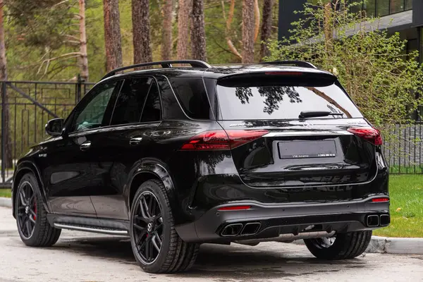 stock image Novosibirsk, Russia -  June 01, 2024: Mercedes-Benz GLE  AMG 63  parked in  park in summer  time,    back    view