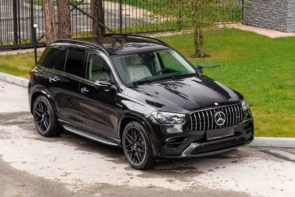 stock image Novosibirsk, Russia -  June 01, 2024: Mercedes-Benz GLE  AMG 63 parked in city. No other car and people. 