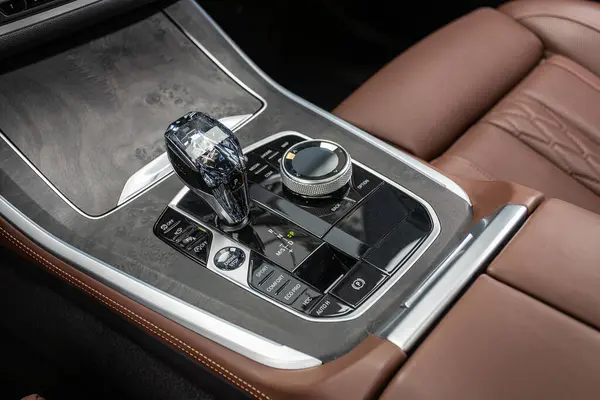 stock image Novosibirsk, Russia -  July 10, 2024: BMW X5, Close up of the manual gearbox transmission handle. Accelerator handle and buttons in a new car. 