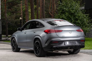 Novosibirsk, Russia -  July 10, 2024: Mercedes GLE 63 AMG Coupe,  parked in city ,    back  view clipart