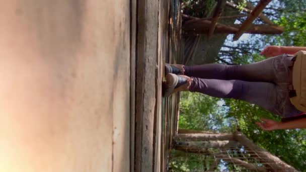 Young Woman Walking Footbridge Nature — Vídeo de Stock