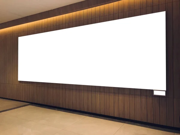 Empty space of digital advertising banner, landscape digital banner on wooden wall in a modern building.