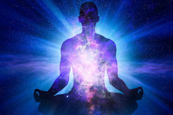 Silhouette of man with the universe inside him