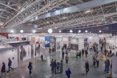 TURIN, ITALY - NOVEMBER 03, 2022: Artissima 2022, people and art collectors at contemporary art fair vernissage  clipart