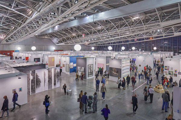 TURIN, ITALY - NOVEMBER 03, 2022: Artissima 2022, people and art collectors at contemporary art fair vernissage 