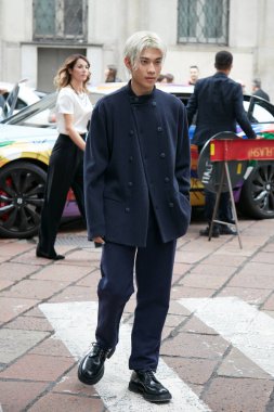 MILAN, ITALY - SEPTEMBER 25, 2022: Yamato before Giorgio Armani fashion show, Milan Fashion Week street style