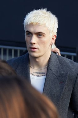 MILAN, ITALY - JANUARY 13, 2023: Tanner Reese before Gucci fashion show, Milan Fashion Week street style