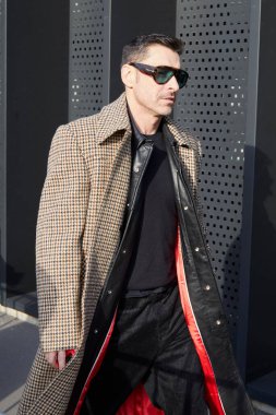 MILAN, ITALY - JANUARY 13, 2023: Alex Badia before Gucci fashion show, Milan Fashion Week street style