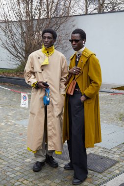 MILAN, ITALY - JANUARY 15, 2023: Mamadou Diagne and Tourek Hadim before Etro fashion show, Milan Fashion Week street style