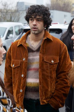 MILAN, ITALY - JANUARY 15, 2023: Massimiliano Caiazzo before Etro fashion show, Milan Fashion Week street style