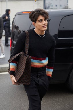 MILAN, ITALY - JANUARY 15, 2023:  Nic Kaufmann before Prada fashion show, Milan Fashion Week street style