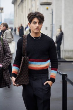 MILAN, ITALY - JANUARY 15, 2023:  Nic Kaufmann before Prada fashion show, Milan Fashion Week street style